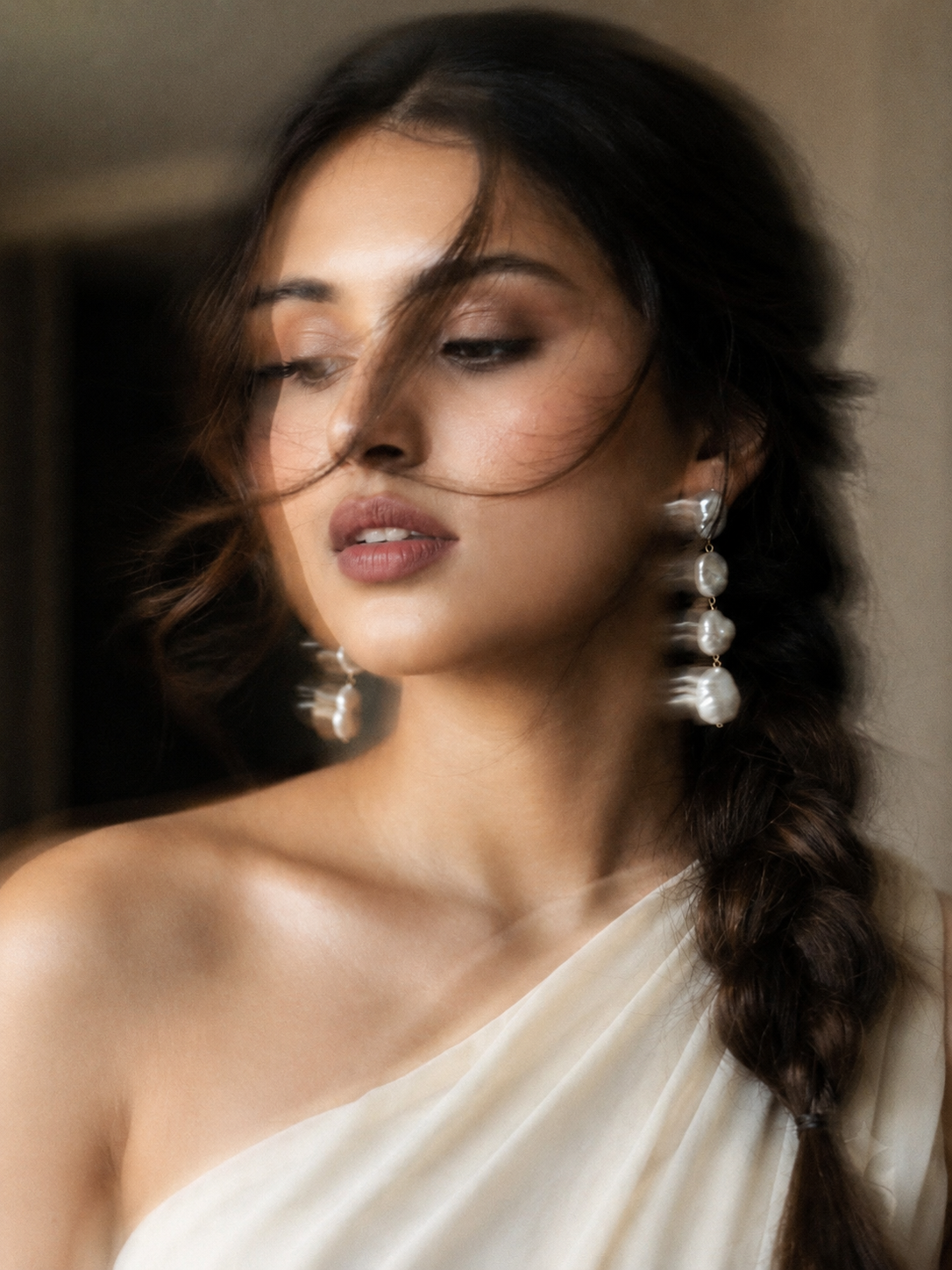 Dreamy Ivory Saree Beauty Portrait – Soft Motion Blur, Side Braid & Pearl Earrings